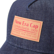 New Era 9FORTY A-Frame Trucker Woven Patch Navy Washed Denim Snapback