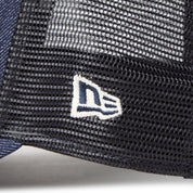 New Era 9FORTY A-Frame Trucker Woven Patch Navy Washed Denim Snapback