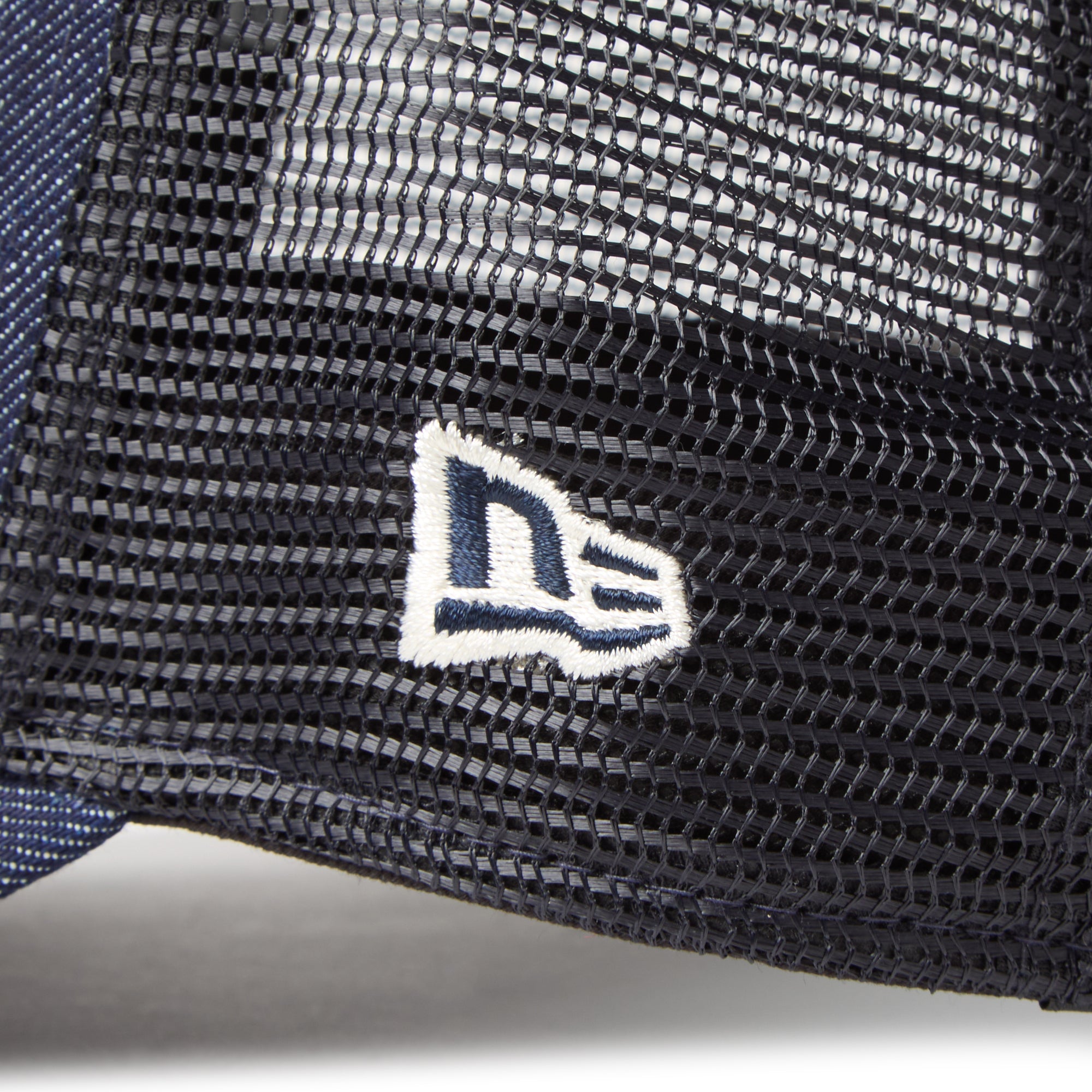 New Era 9FORTY A-Frame Trucker Woven Patch Navy Washed Denim Snapback