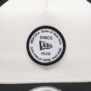 New Era 9FORTY A-Frame Round Patch Chrome White Black Trucker Cap
