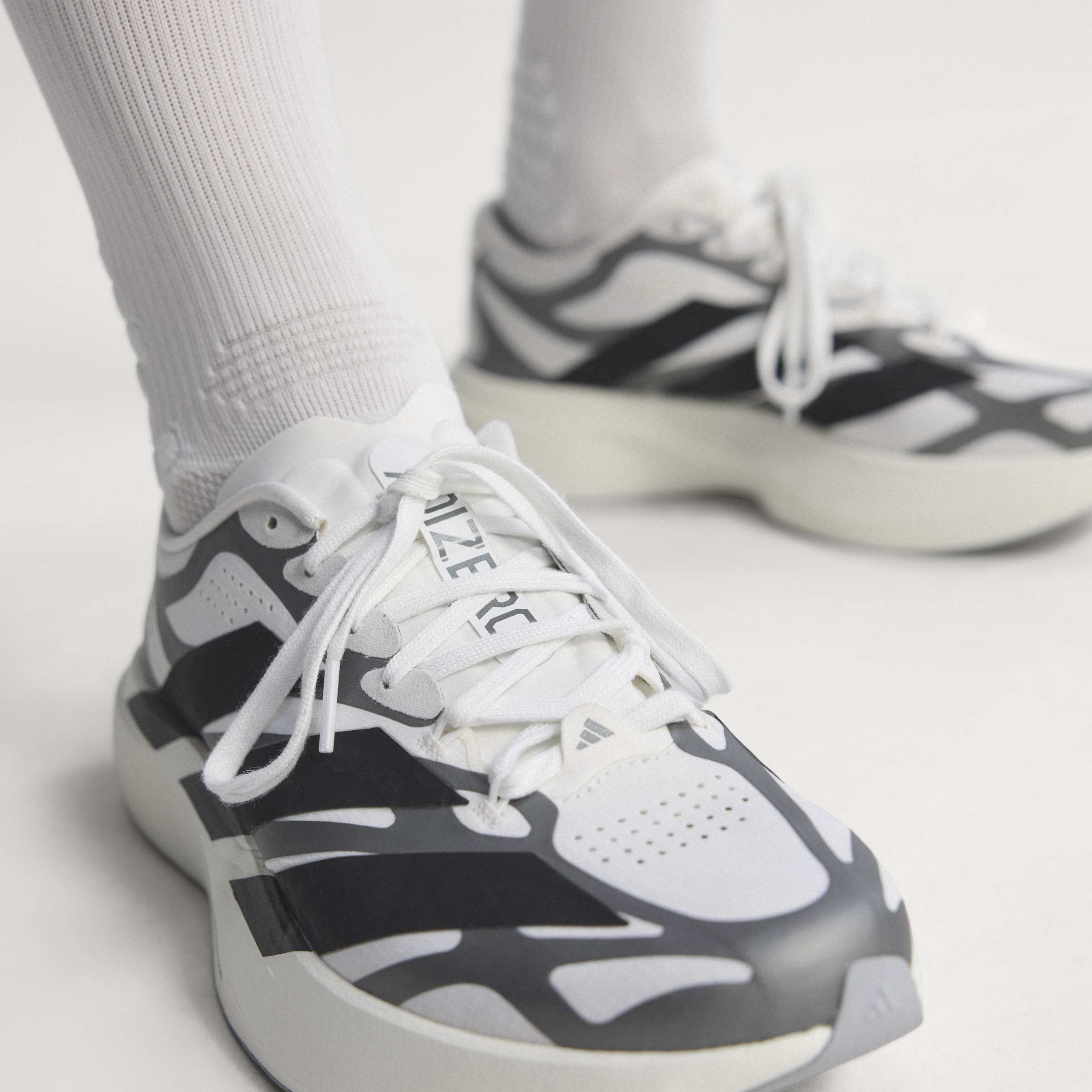 adidas Men's Adizero Evo SL EXO Running Shoes